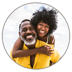 couple-smiling-within-circle-250px.png